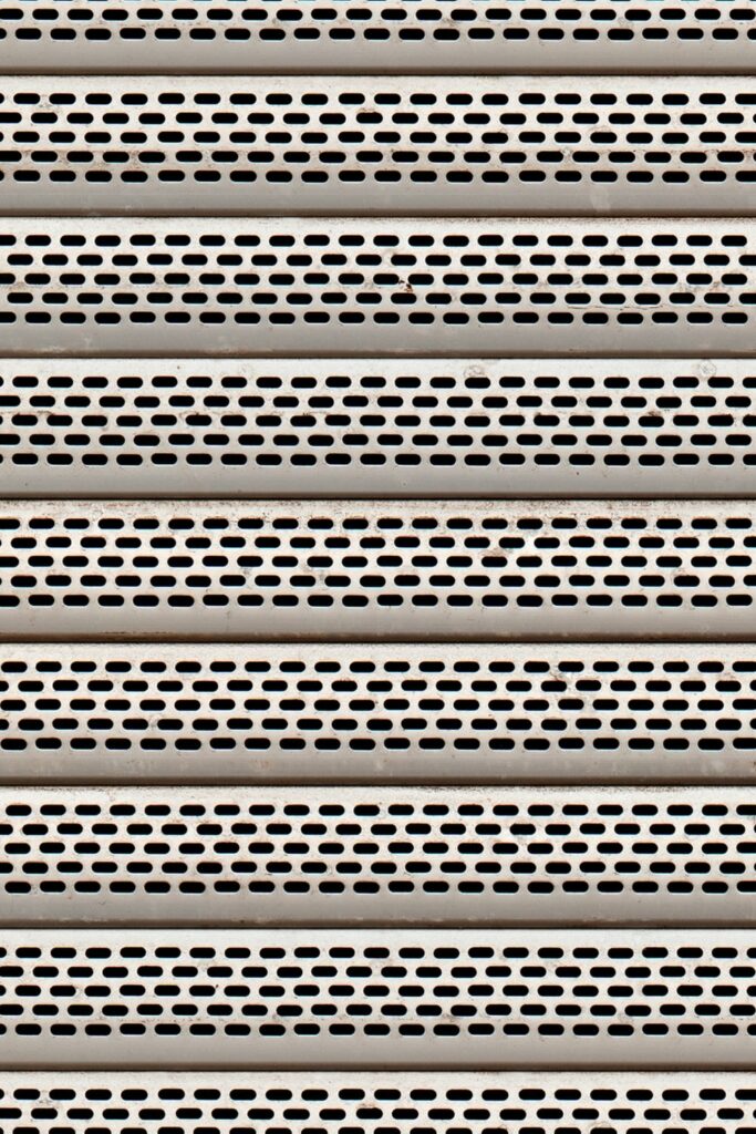 perforated shop front roller shutter close-up